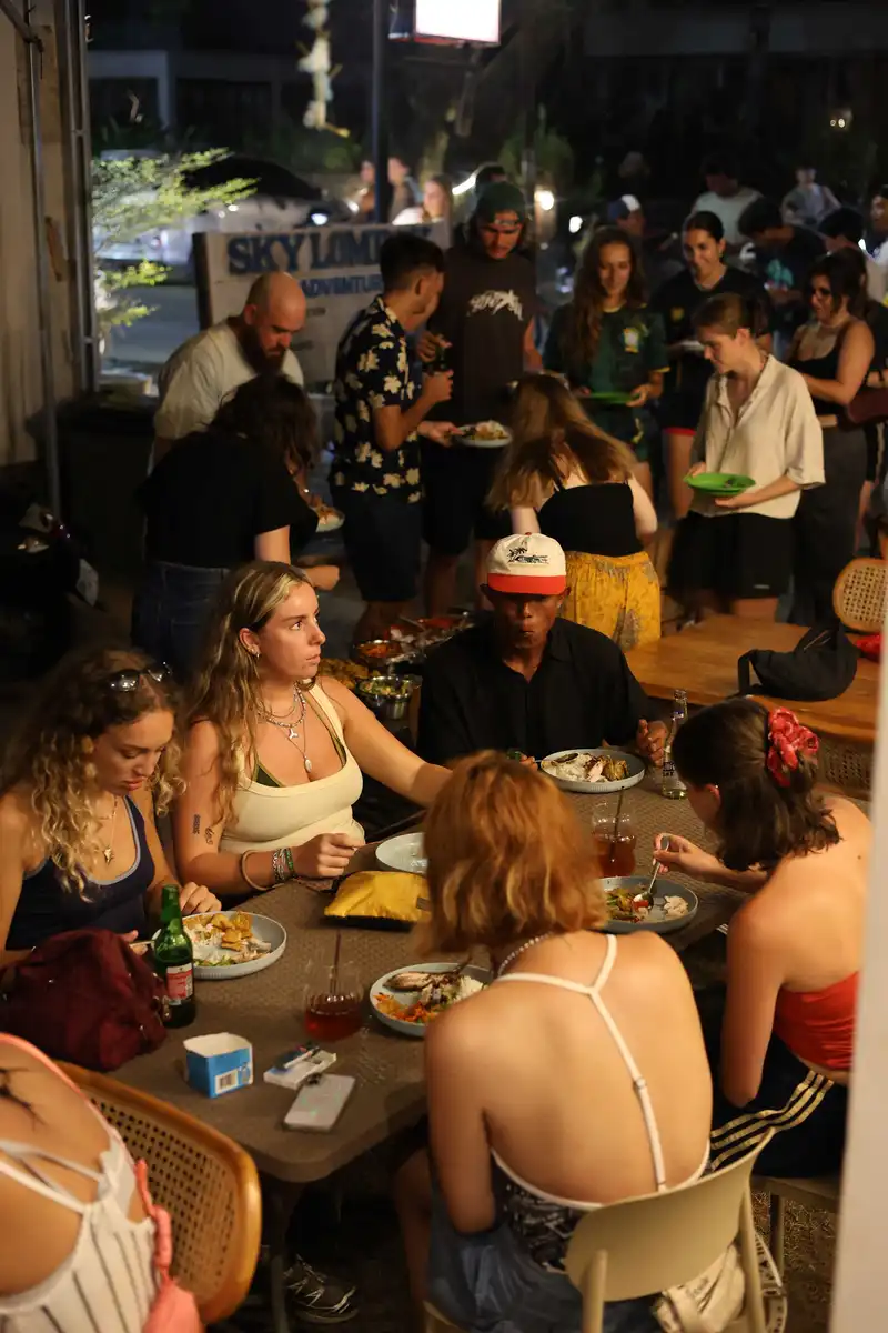 Guest enjoying Surfwell Cafe at night